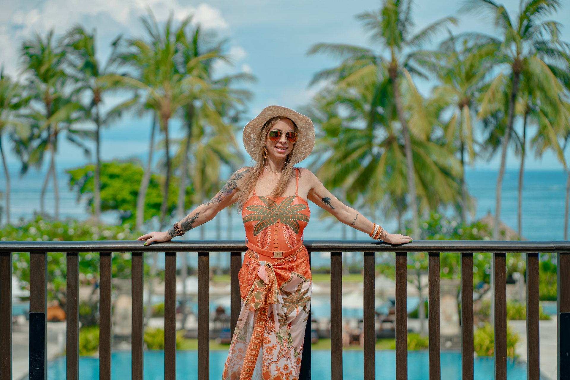 Alyssa on the phone at a resort